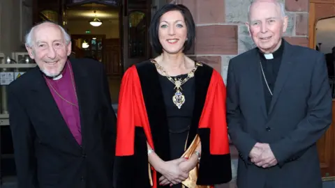 DIOCESE OF DERRY AND RAPHOE Retired Church of Ireland Bishop of Derry and Raphoe James Mehaffey and Catholic Bishop of Derry, Dr Edward Daly receive the freedom of Derry