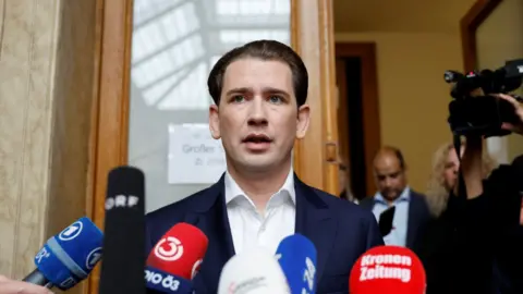 Sebastian Kurz speaks to media outside the court room