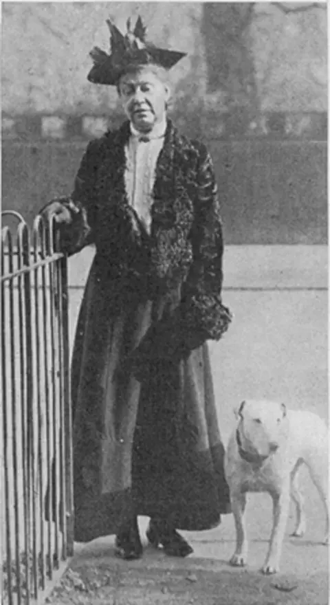 The Tatler Ruth Belville and a dog