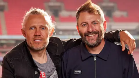 Simon Dael/Shutterstock Jimmy Bullard and John Fendley, co-hosts of Soccer AM