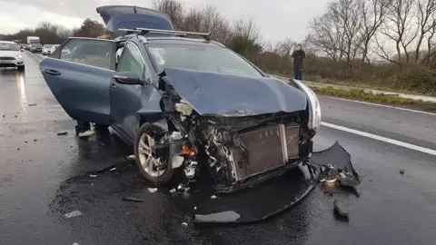 Sam Fletcher Fletcher family's car after aquaplaning into the central reservation of the M5