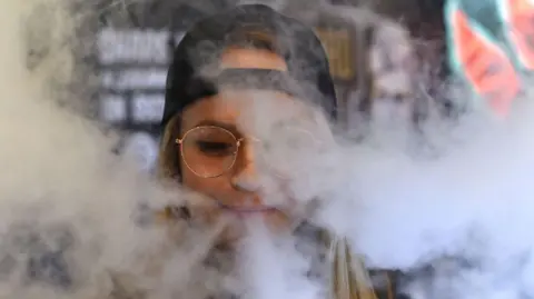 A woman vaping