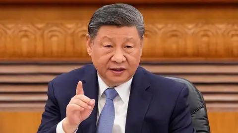 Chinese President Xi Jinping speaks during an international business meeting at The Great Hall Of The People on 28 March, 2025 in Beijing, China.