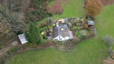 An aerial image of the remote home where bomb suspect Daniel Andreas San Diego lived