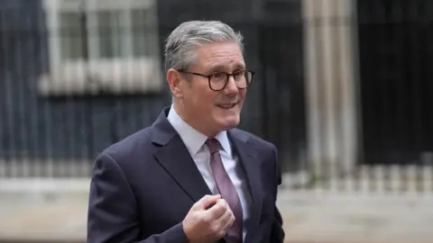 PA Media Sir Keir Starmer speaks to the media in Downing Street