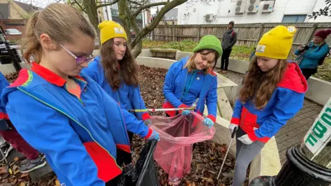 Steve Huntley/BBC Girlguides taking part in an Ely litter pick