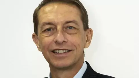Mid and South Essex Trust Man smiling at the camera