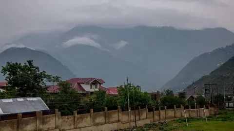 Getty Images Mountains of Indian-administered and Pakistani-administered Kashmir face each other in the mostly deserted town of Uri, near the Line of Control (LoC) in Uri, west of Srinagar, India.