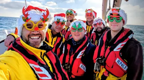 RNLI Jersey RNLI Jersey crew in Christmas gear