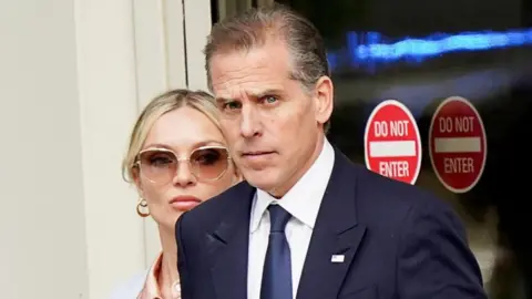 Hunter Biden, son of U.S. President Joe Biden, departs the federal court with his wife Melissa Cohen Biden, on the second day of his trial on criminal gun charges in Wilmington, Delaware, U.S., June 4, 2024. 