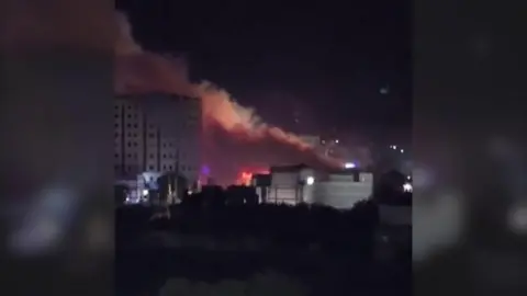 Smoke rising from a hotel in Somali capital