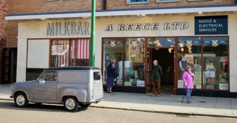 David Levene A milk bar and electrical shop at Beamish museum, with visitors pictured on the pavement outside