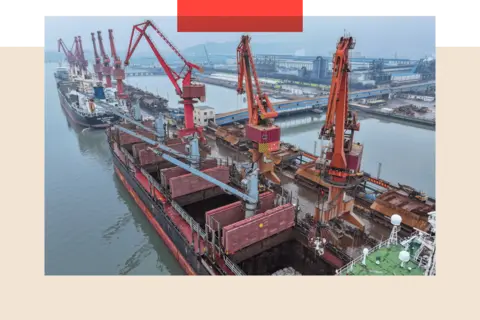 Getty Images A ship carrying tons of nickel ore carries out loading and unloading operations in China
