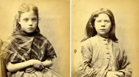 North East Museums Two sepia mugshots of young girls side by side. The girl on the left looks nervous and is holding her wrist on her lap. She is wearing a checked shawl and has half of her light hair tied up. The girl on the right has brown, shoulder-length hair and is looking into the camera with a slight scowl. She is wearing a light jacket.
