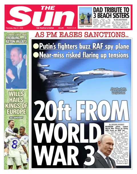 "20ft from World War 3," reads the headline on the front page of the Sun.