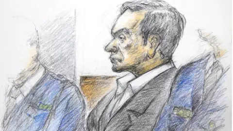 Getty Images This courtroom sketch illustrated by Masato Yamashita depicts former Nissan chairman Carlos Ghosn attending his hearing at the Tokyo district court on January 8, 2019