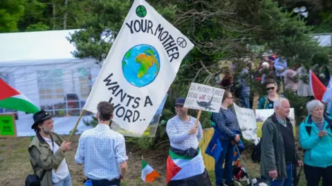 PACEMAKER Participants, including former Labour Minister Jan O’Sullivan, protest at a Peace Camp at the boundary of Shannon Airport
