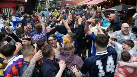 PA Media fans in Leicester Square on Friday