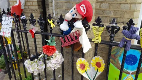 PA Tributes outside Notting Hill Methodist Church