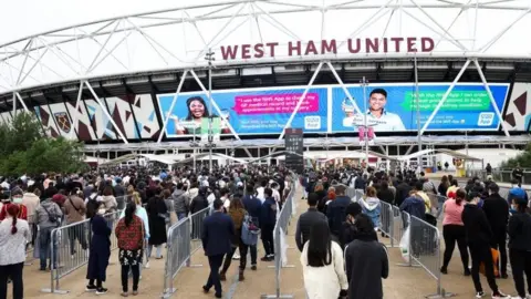 Reuters Queue outside the London stadium