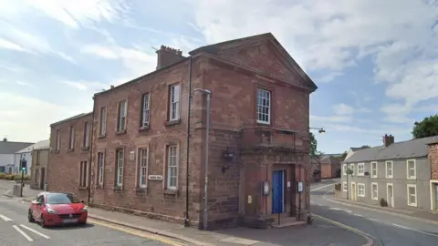 Google Streetview of an old red stone police station in Brampton