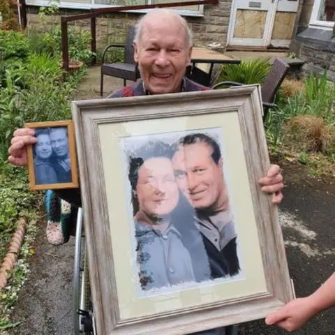 Family handout Bert Vincent with his portrait