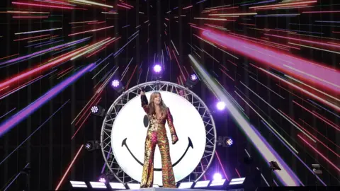 PA Media Becky Hill performing on the main stage at TRNSMT