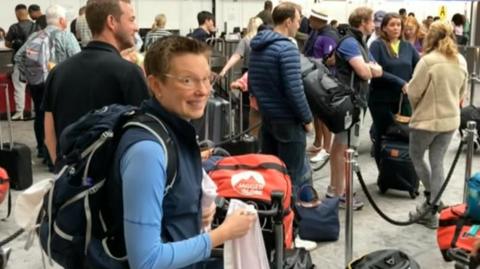 Tracey Crouch in the luggage queue at Gatwick