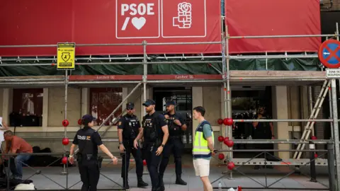 Spanish police cordon off access to the Socialist Party's headquarters on a judicial order to gather information on a possible illegal financing scheme.