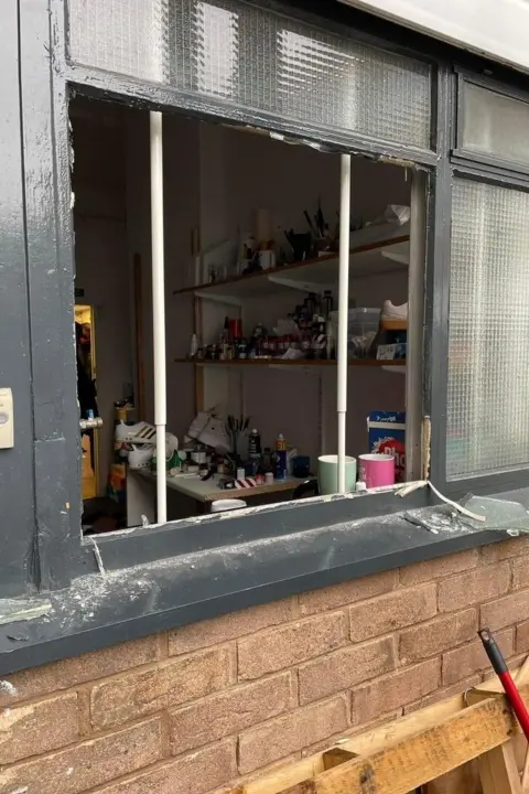 Steve Tapp/Wrexham Trainer Revival Damaged window at Wrexham Trainer Revival