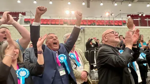 Reform supporters applauding and cheering