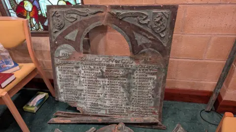 Christ Church Luton The damaged WW1 plaque which has been recovered after being stolen from
the grounds of Christ Church Luton in Chatham last weekend.