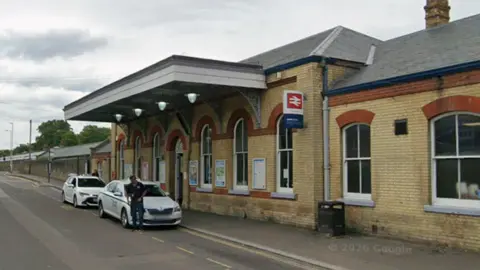 A Google Street Map picture of the entrance to Faversham Railway Station.