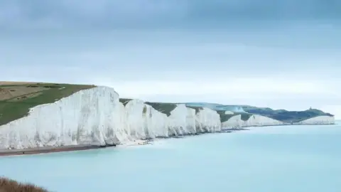 Getty Images An aerial shot showing white cliffs and sea at Seven Sisters in East Sussex