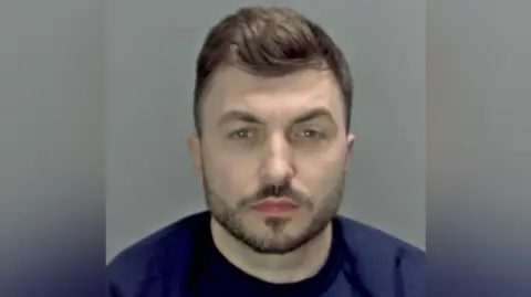 Norfolk Police Custody photo of Alexandru Tapurin