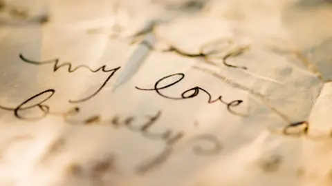 Getty Images A close up of a love letter