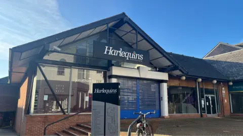 BBC The derelict site of the Harlequins shopping centre in Exeter