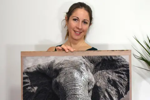 Naomi Jenkin with her artwork