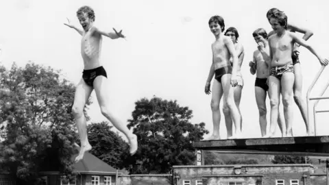 Nottingham Local Studies Library Boys jumping off diving board