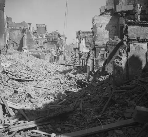 Getty Images Destroyed buildings in Amritsar after widespread communal violence in March 1947.