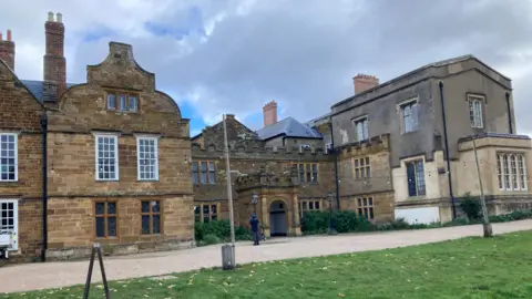 James Grant/BBC A grand looking building with arches and bay windows