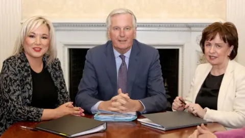 Getty Images Michelle O'Neill, Michel Barnier and Diane Dodds