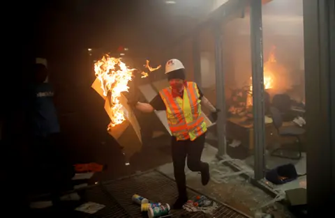 Reuters Protesters are seen inside Minneapolis Police 3rd precinct