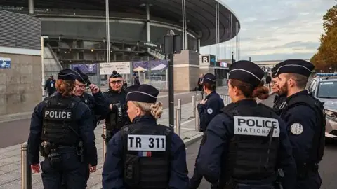 AFP French police officers patrol prior to the UEFA Nations League Group A2 football match between France and Israel outside the Stade de France stadium, in Saint-Denis, in the northern outskirts of Paris, on November 14, 2024. 