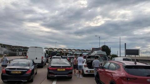 Cars queue to check in at the Folkestone Eurotunnel Le Shuttle terminal