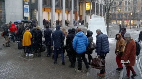 EPA People queue to enter the courthouse in Oslo, Norway - November 2017