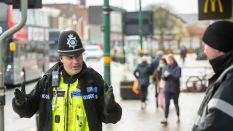 West Midlands Police Officer chatting to person