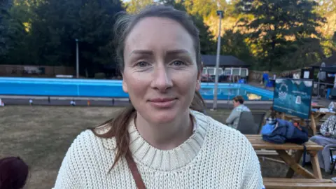 Tamsin Silver at New Bath Lido, looking at the camera