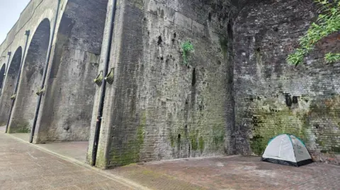 Aisha Iqbal/BBC Tent in arch