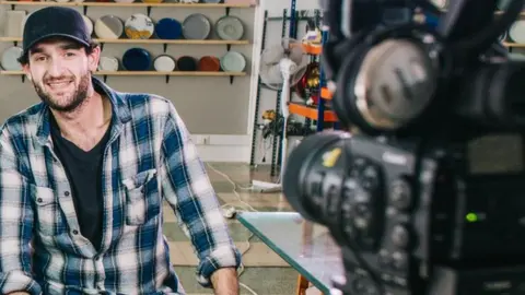 Ben with Lorenzo in his studio in Portugal